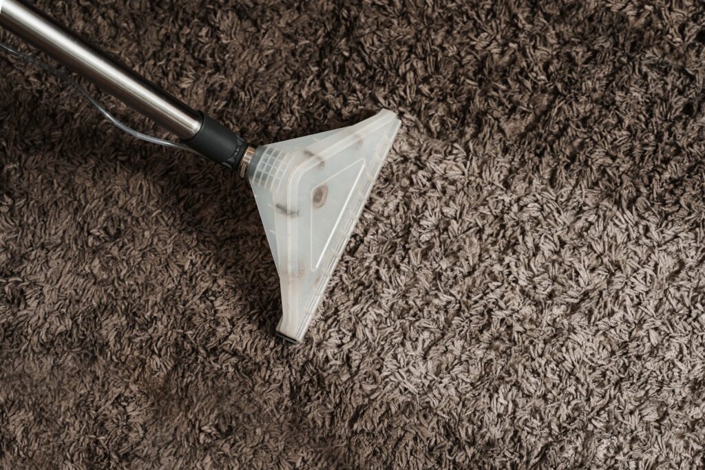 dirty carpet with vacuum